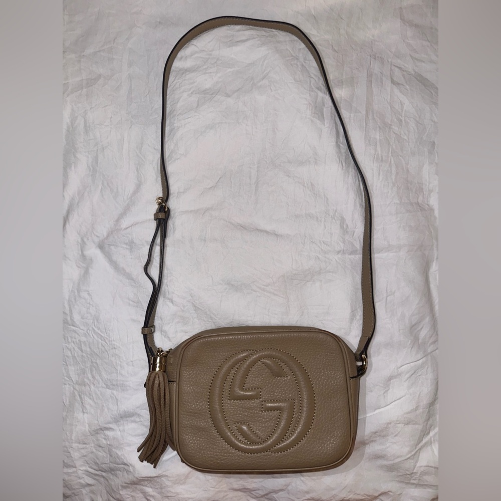 Gucci bag in okay condition, not very noticeable when worn out!